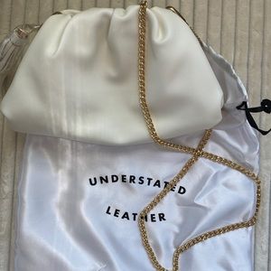 Understated Leather ivory clutch